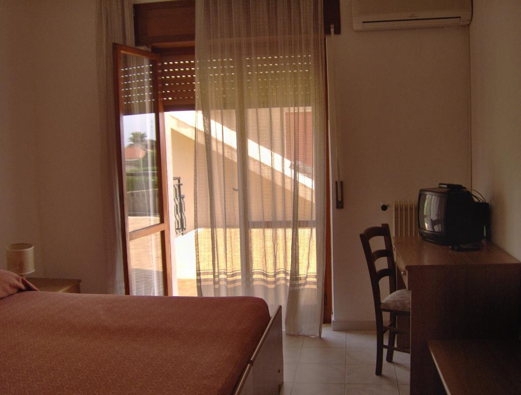 Hotel Svizzero Sangineto Pokoj fotografie