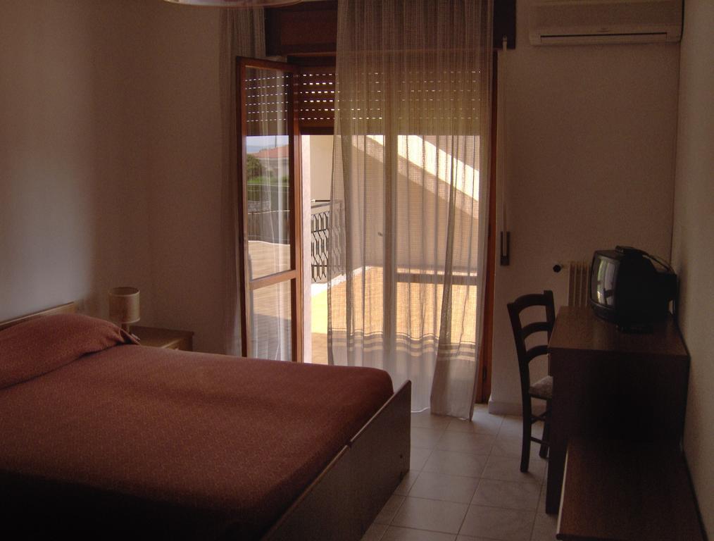 Hotel Svizzero Sangineto Pokoj fotografie